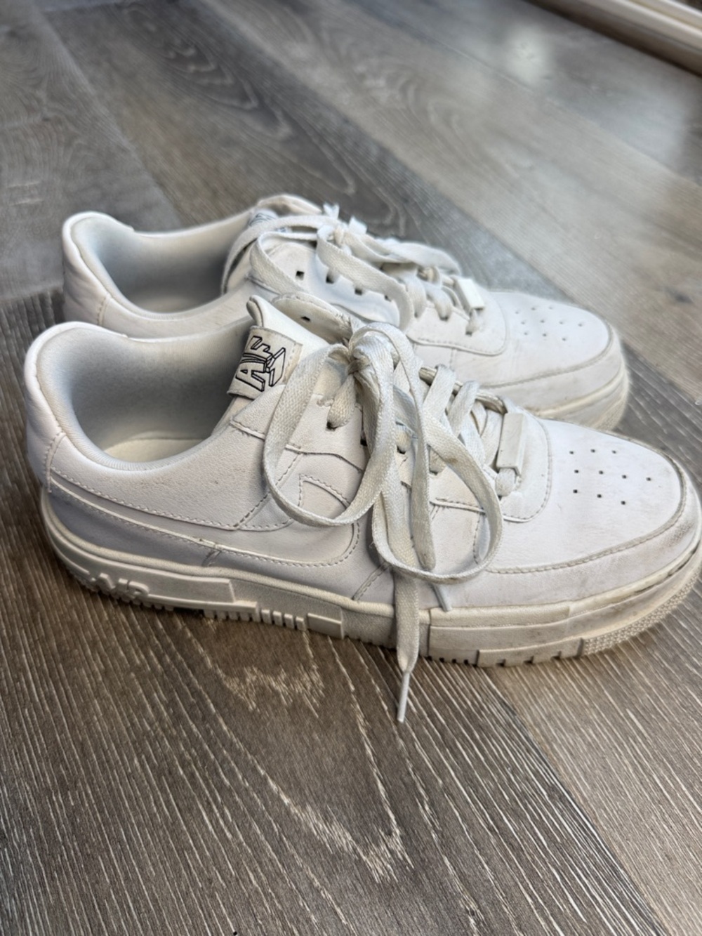 White Nike Air Force Ones Low-Top Women's Sneakers with Clean Leather Upper